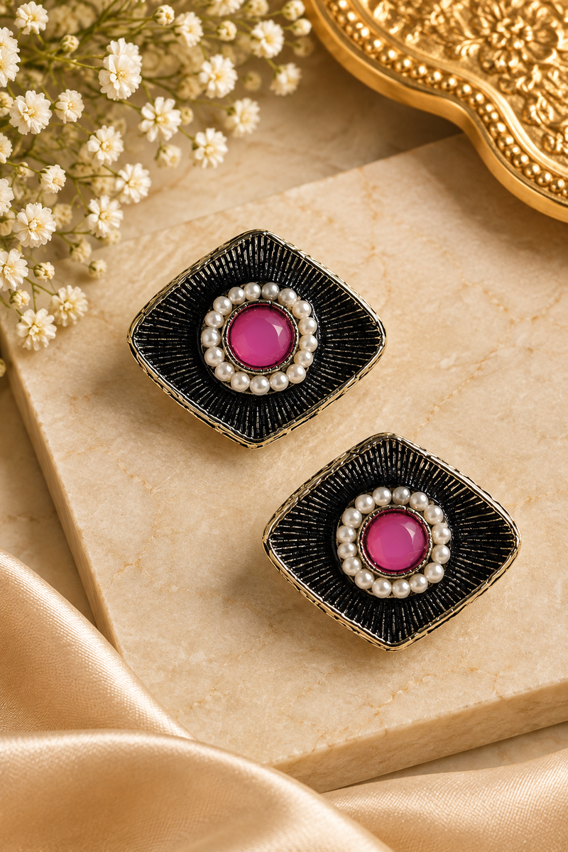 Black oxidized metal with a fine textured/radiating pattern