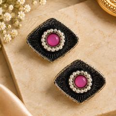 Black oxidized metal with a fine textured/radiating pattern