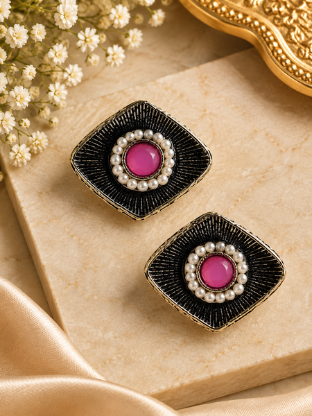 Black oxidized metal with a fine textured/radiating pattern
