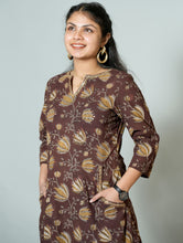 Hand Block Printed Side Kali Kurta Embellished With Hand Embroidery and sequin detail.