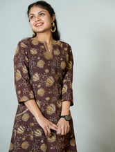 Falak Hand Block Printed Side Kali Kurta Embellished With Hand Embroidery and sequin detail.