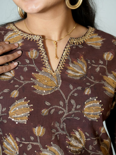 Falak Hand Block Printed Side Kali Kurta Embellished With Hand Embroidery and sequin detail.