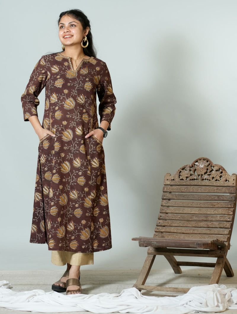 Falak Hand Block Printed Side Kali Kurta Embellished With Hand Embroidery and sequin detail.