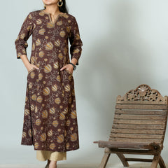 Falak Hand Block Printed Side Kali Kurta Embellished With Hand Embroidery and sequin detail.