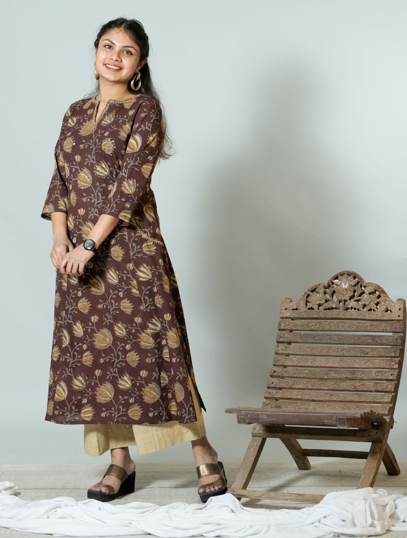 Falak Hand Block Printed Side Kali Kurta Embellished With Hand Embroidery and sequin detail.